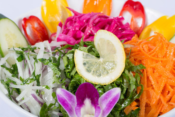 Various fresh mix salad leaves with tomato in bowl 