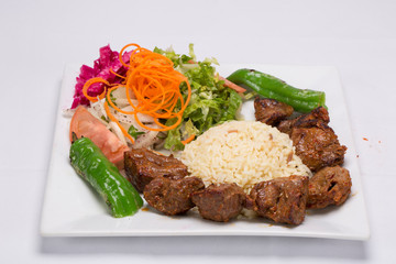 Lamb kebabs with fresh vegetables,green peppers, onions and carrot 