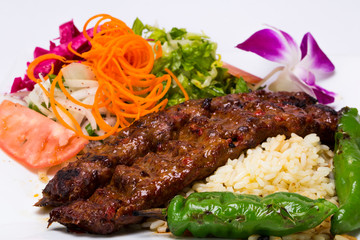 Traditional Adana Kebap with salad 