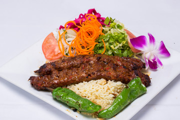 Traditional Adana Kebap with salad 