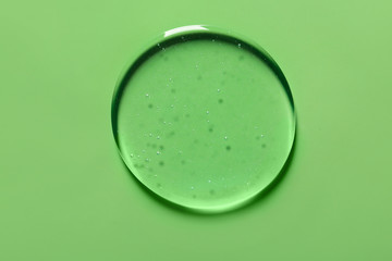 Shower gel on color background