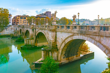 Fototapeta premium Rome, Italy. Ponte Sant'Angelo (Bridge of Angels) a Roman pedestrian bridge in Vatican City spanning Tiber River. Originally it was known as Pons Aelius (Aelian Bridge) or Bridge of Hadrian.