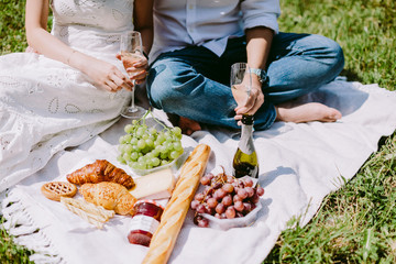 couple having breakfast outdoors on picnic