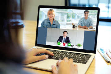 Fototapeta na wymiar Video conference, Work from home, Brainstorm planing teamwork, Asian business team making video call by virtual web, Group of asia team online telecommunication meeting by laptop computer