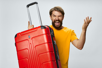 young man with suitcase