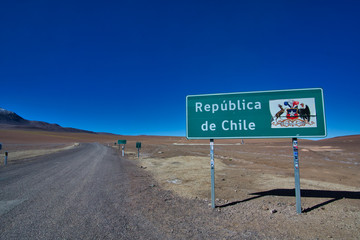 Road sign of the Republic of Chile at the Chilean border to Bolivia