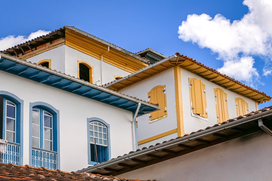Close up of upper storeys of typical colonial buildings in the historical town of Serro, Minas Gerais Brazil
