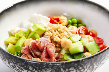 Couscous with beef and cut vegetables