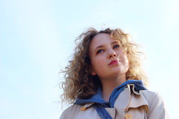 Close up portrait of a young girl outdoor. People, travel, nature concept.
