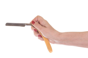 Female hand holding Vintage straight razor