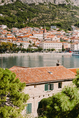 Old town view with mountains and red roofs in Croatia