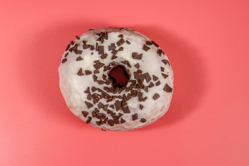 Tasty donut on a pink background