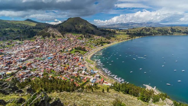 Copacabana, Bolivia, time lapse view of waterfront and Lake Titicaca on a sunny day.