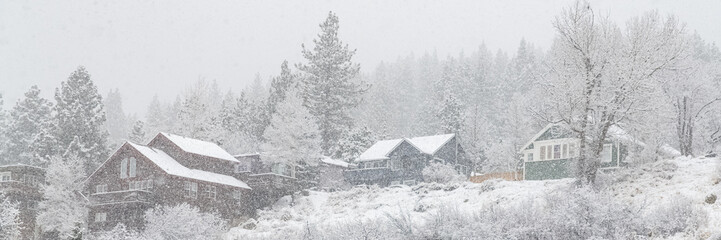 Wooden chalets in the village, typical architecture in the Sierra Nevada, California in winter
