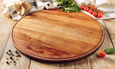 Cutting board on wooden surface