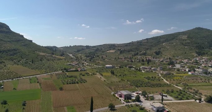 Beautiful panning shot view of a small village town in Greece in a sunny day, Nemea