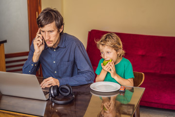 Man is trying to work from home because of the coronovirus epidemic, but his son is stopping him....
