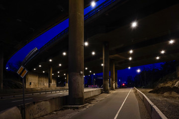 Fototapeta na wymiar Stockholm, Sweden An illuminated underpass in Liljeholmen