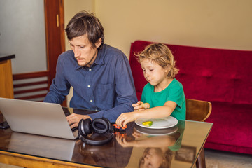 Man is trying to work from home because of the coronovirus epidemic, but his son is stopping him....