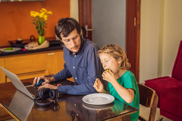 Man is trying to work from home because of the coronovirus epidemic, but his son is stopping him....