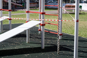 Fototapeta na wymiar playground blocked with warning tape