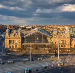 Budapest, Hungary - Aerial view of the Nyugati Railway Station in warm sunlight at sunset. The...