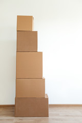 Cardboard boxes for moving in interior apartment,