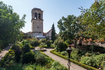 Fototapeta na wymiar SIBENIK / CROATIA - AUGUST 2015: Small garden in the historic centre of Sibenik, Croatia