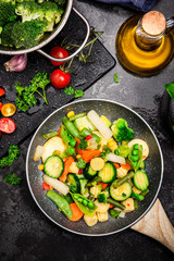 Stir Fry Vegetables on Pan. Healthy Eating and Dieting at Home. Dark Tones Image. Top Down View