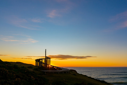 after sunset with view to the dock of time in the archipelago of chiloe.