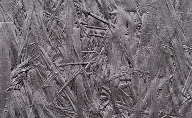 Background of pressed and painted wood sawdust.