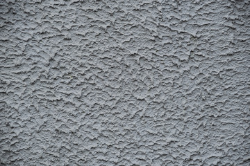 Concrete background with a dirty texture in the form of drips and drops.