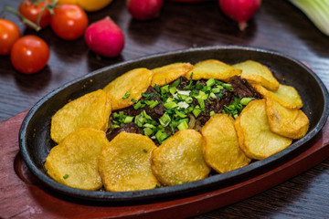 meat baked with potatoes