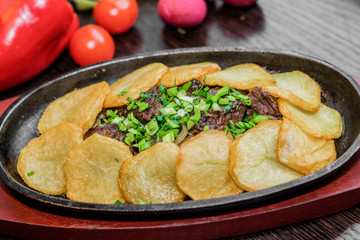 meat baked with potatoes