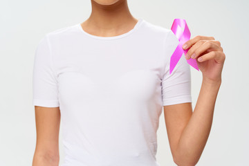 woman holding a white t shirt