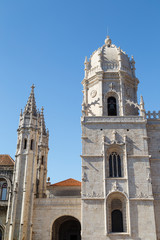 View of the historic Mosteiro dos Jeronimos (Jeronimos Monastery) in Belem, Lisbon, Portugal, on a sunny day.
