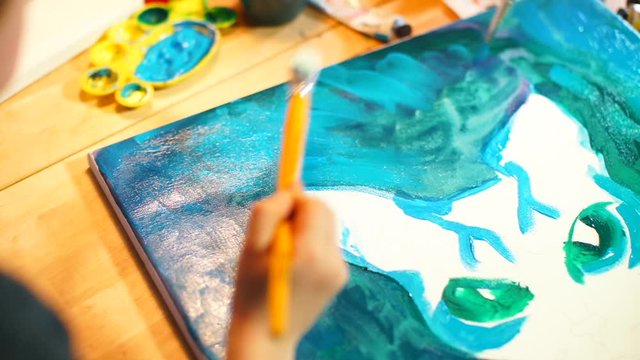 Family education at home in self-isolation COVID-19. Family paints together. The versatile development of the child. Knowledge of the basics сolorimetry science. Each color is sum three other colors. 