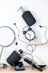 Morning hygiene supplies are scattered in disarray on a white background. The concept of the...