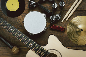 Table top view of music instrument tools concept background.Flat lay of sign to sing for musician...