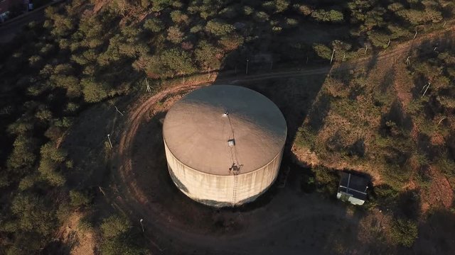 4K aerial drone video savanna hills, old historical water storage reservoirs in Klein Windhoek residential suburb in Namibia's capital in central highland Khomas Hochland of Namibia, southern Africa