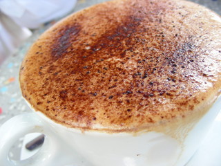 cup of cappuccino with chocolate