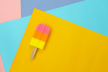 Table top view aerial image of sign or food of summer season holiday background concept.Flat lay of pastel ice cream on modern rustic mix paper backdrop.Minimalism creative design. copy space.