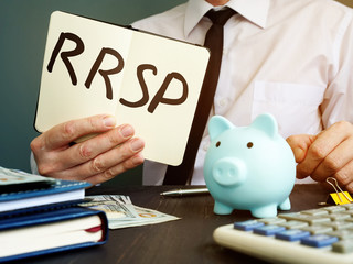 Sign in the notepad RRSP Registered Retirement Saving Plan.
