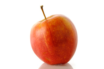 Close up red Apple fruit isolated on white background with reflection