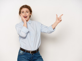 young woman pointing at something