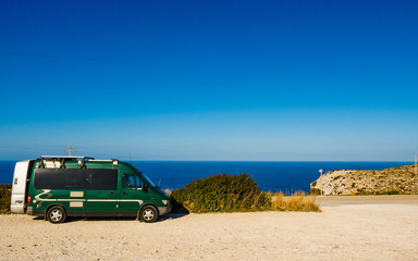 Fototapeta na wymiar Camper car on Cape San Antonio, Spain