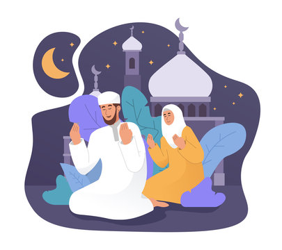 Muslim Man And His Wife Praying Together At Night