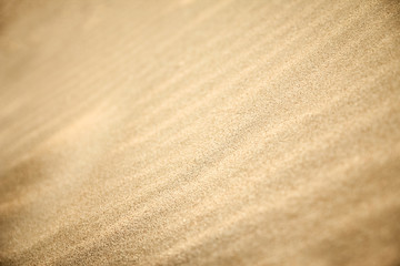 A Sand by the sea on vacation traveling background.