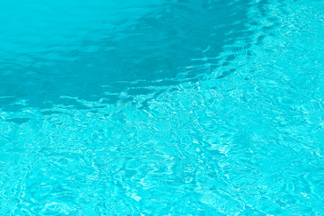 Beautiful swimming pool at the seaside hotel in park background