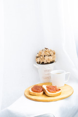 Hot sandwiches with jam for breakfast with tea on a white background. Toast with jam for breakfast. Photo of toasts with jam.